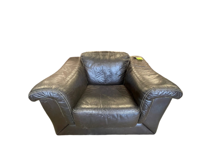 Dark brown leather armchair