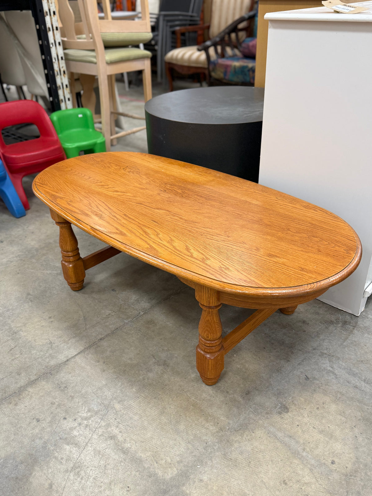Light Wood Brown Oval Shaped Coffee Table