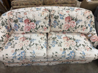 White Floral Loveseat with Throw Pillows