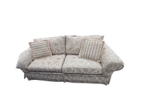 Elegant Skirted Cream Floral Sofa