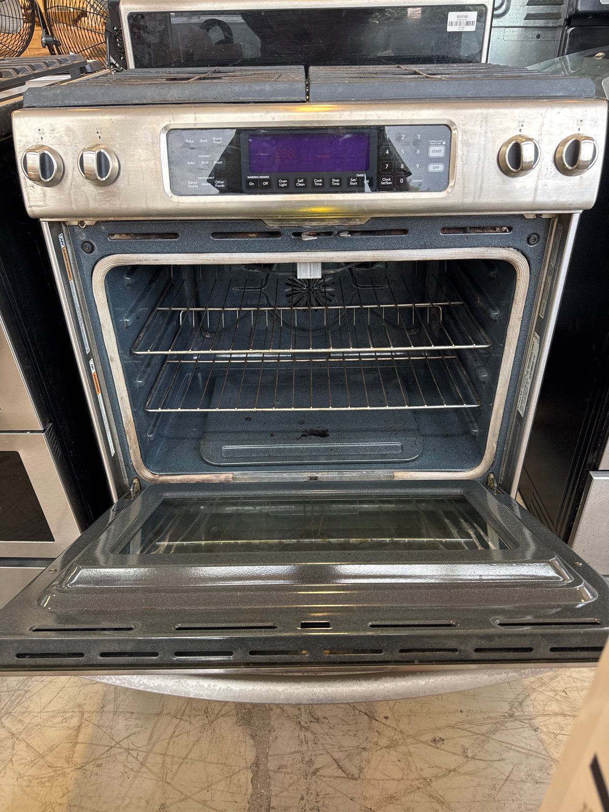 KitchenAid Architect Series II 30-inch slide-in gas range (Model KGSS907SSS) featuring a stainless steel finish, continuous cast-iron grates, and a digital control panel.