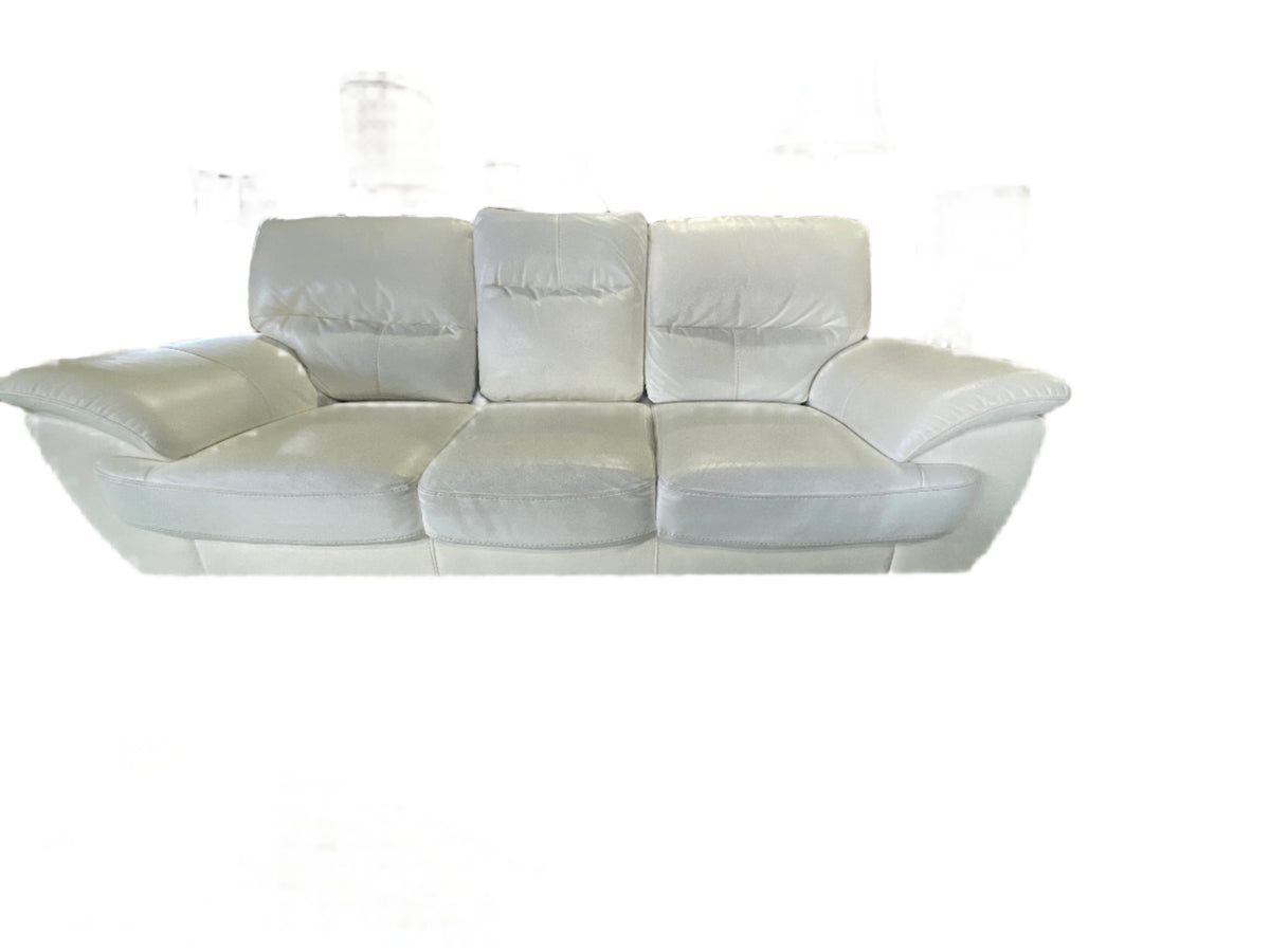 White leather three seater couch