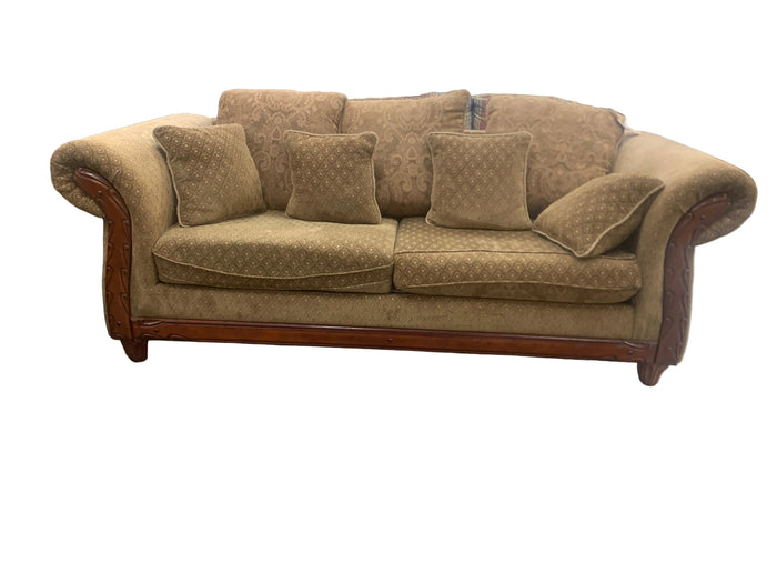 Brown Loveseat With Wooden Trim Accents