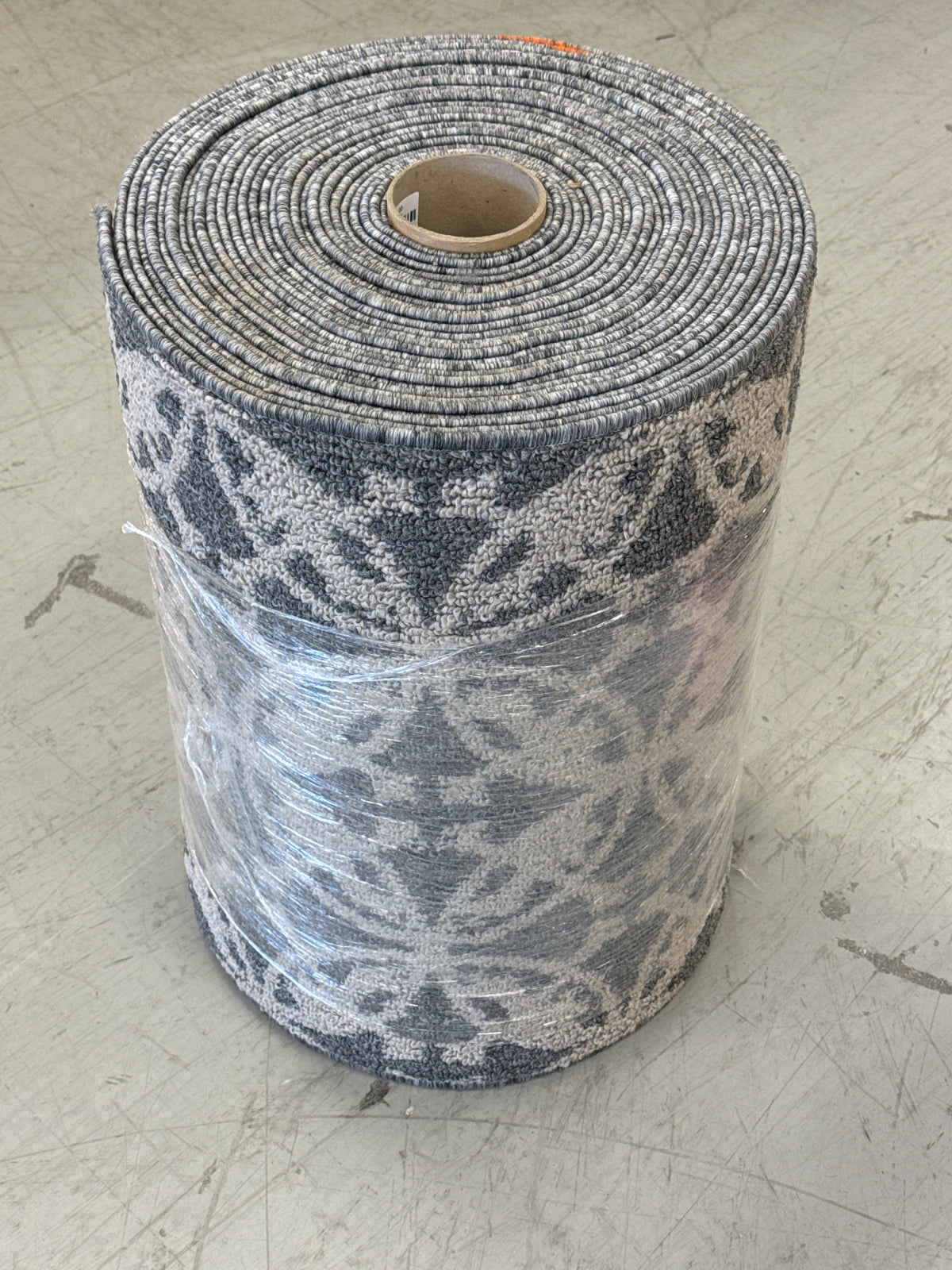 Area Rug Featuring A Distinctive Two-Tone Medallion or Floral Damask Pattern.