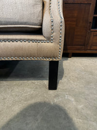 Tufted wingback armchair