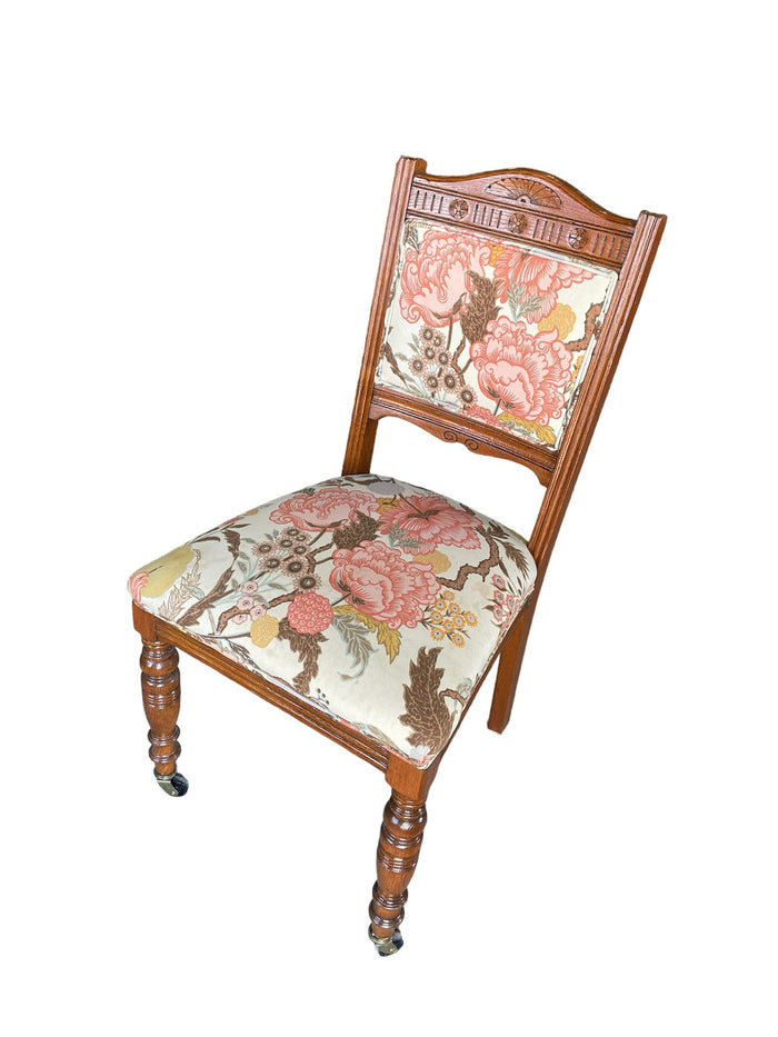 Upholstered Patterned Chair with Wheels