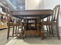 Tudor Dining Set-A table with six chairs
