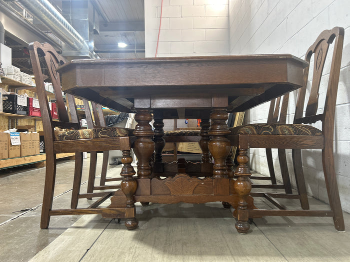 Tudor Dining Set-A table with six chairs