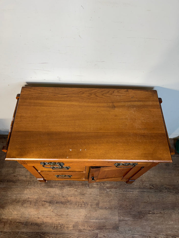 Solid Oak Washstand Cabinet With Ornate Brass Pulls & Side Towel Bars