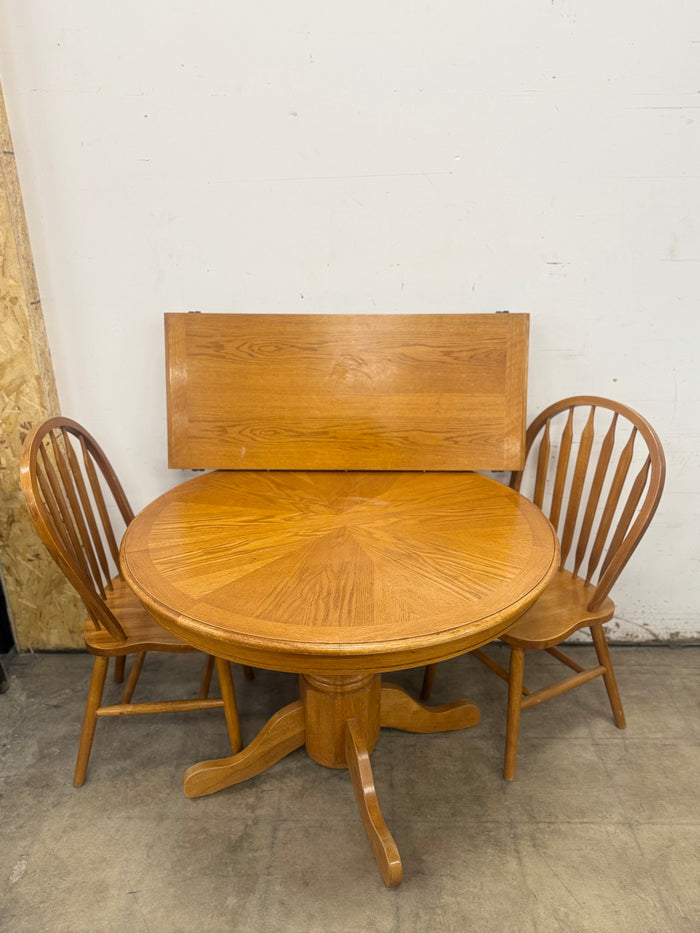 Light Wood Circular Dining Set