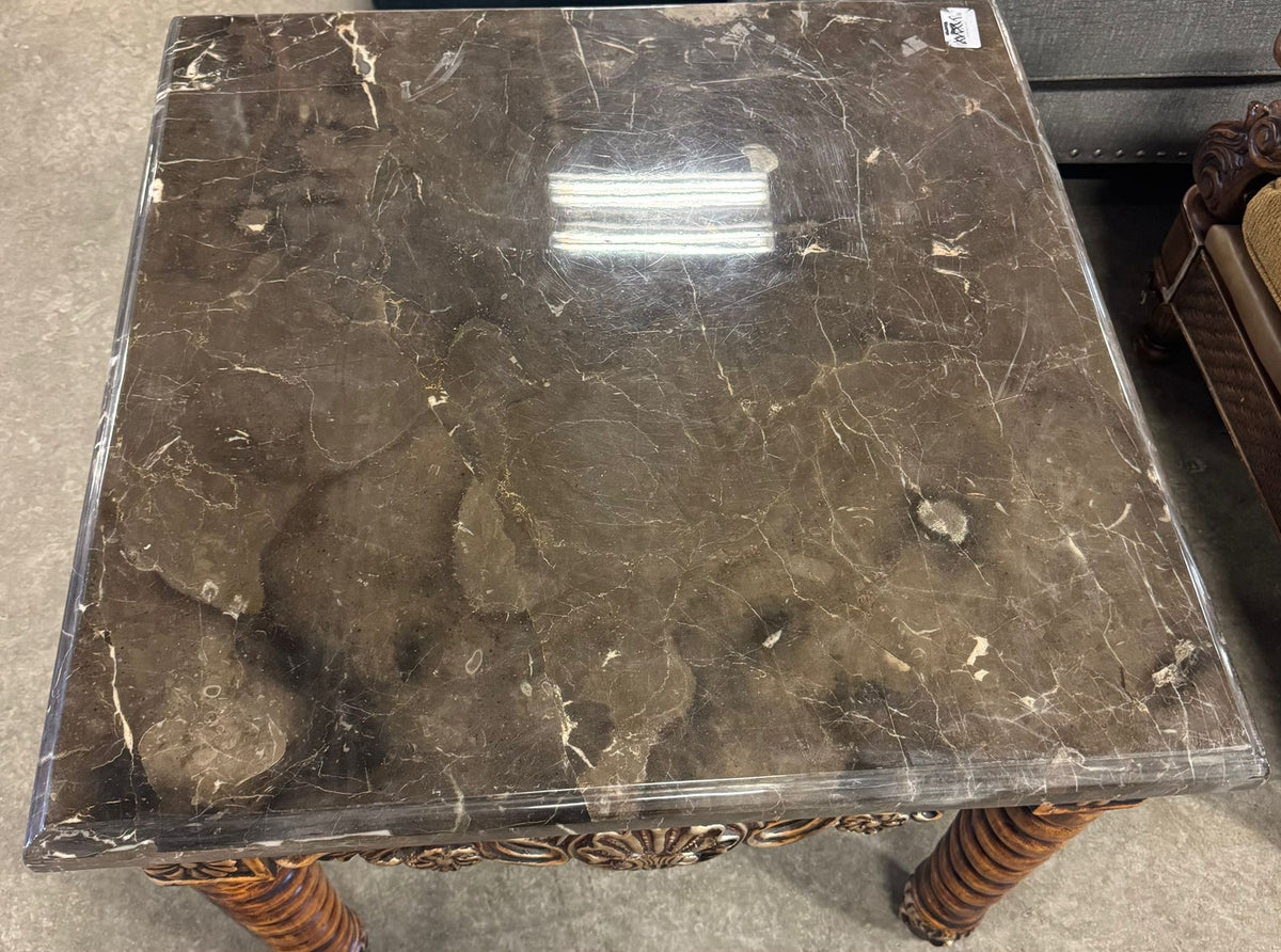 Dark brown marble table