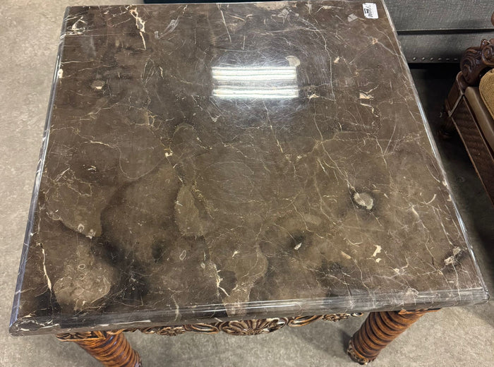 Dark brown marble table