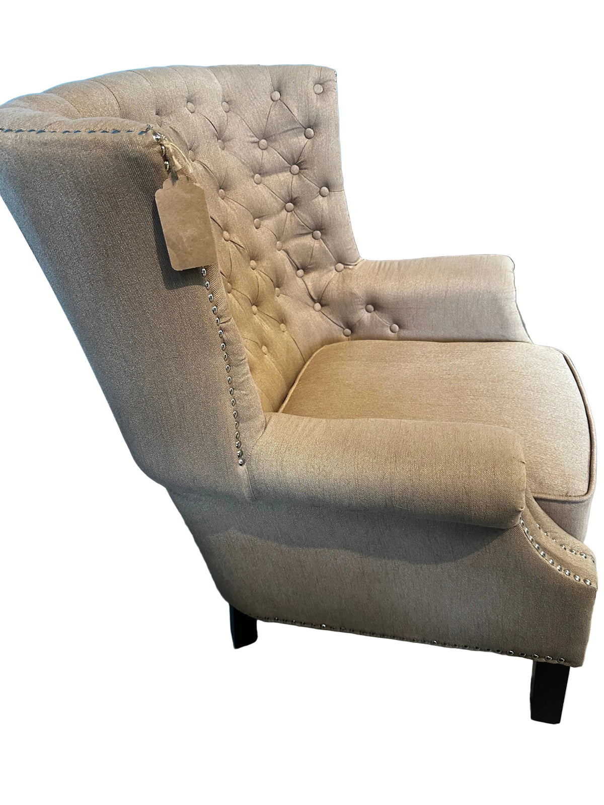 Tufted wingback armchair
