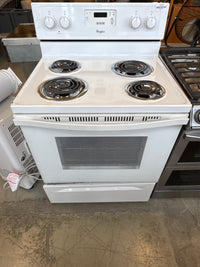 White Whirlpool Freestanding Electric Range Featuring A Four-Coil Burner Cooktop And A Rear Control Console.