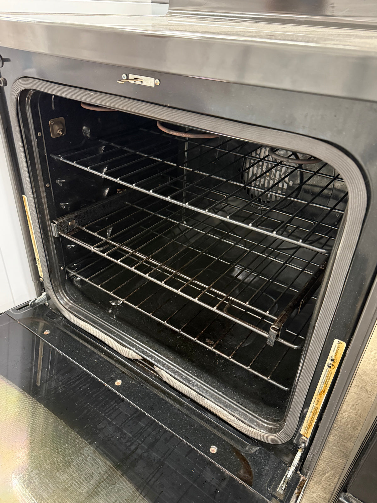 Black and Stainless Steel GE Free-Standing Electric Stove