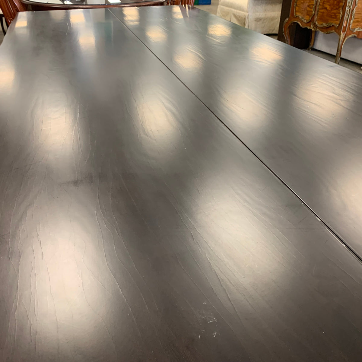 120-Inch W Summit Dining Table – Textured Dark Wood with Sculptural Base
