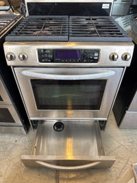 KitchenAid Architect Series II 30-inch slide-in gas range (Model KGSS907SSS) featuring a stainless steel finish, continuous cast-iron grates, and a digital control panel.