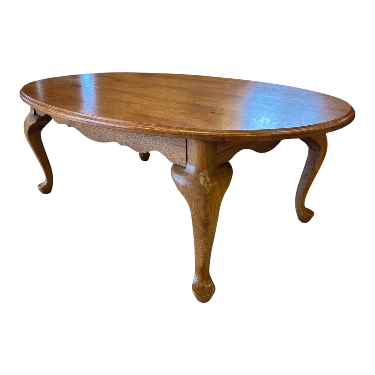Oak Toned Oval Coffee Table