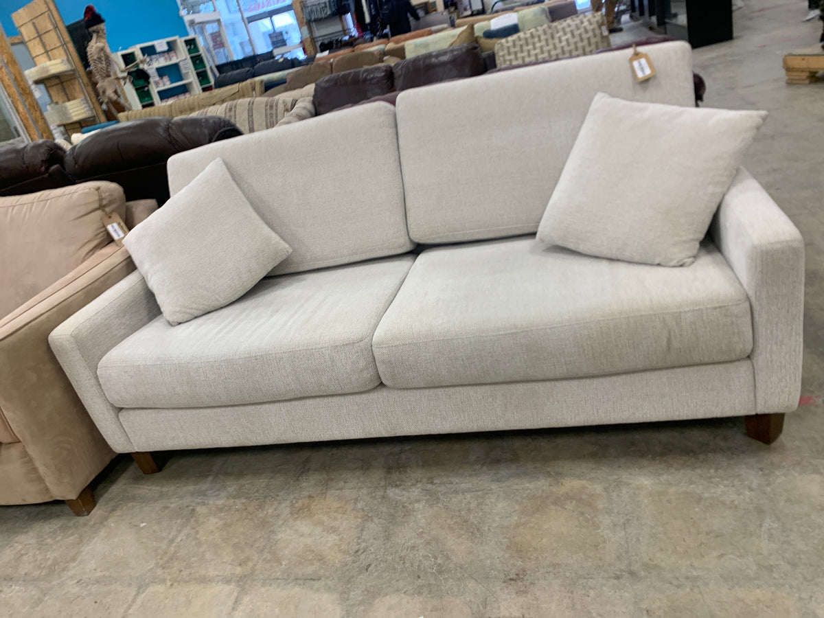 Light Grey Sofa With Accent Pillows