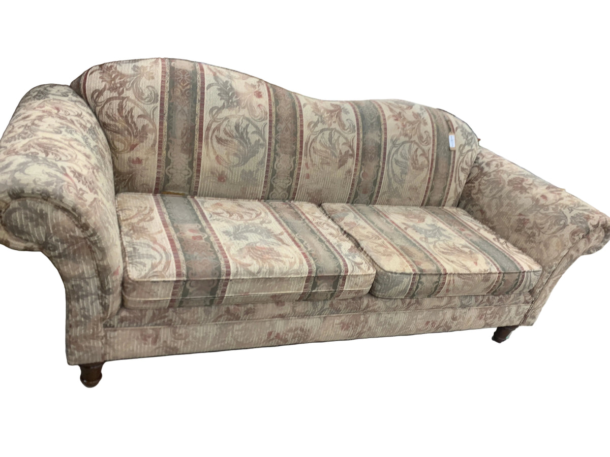 Golden Brown Sofa With Red And Green Accents