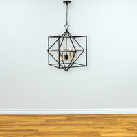 Roxton 60W 4-Light Chandelier in Matte Black and Harvest Brass Finish, E12 Bulb Base