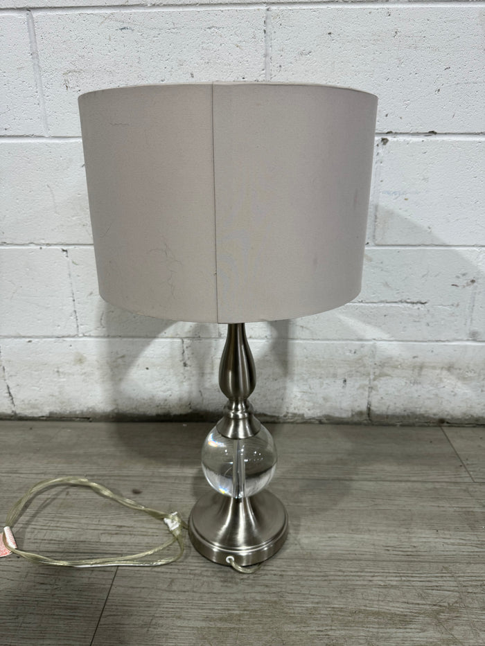 Lamp with metal and glass base