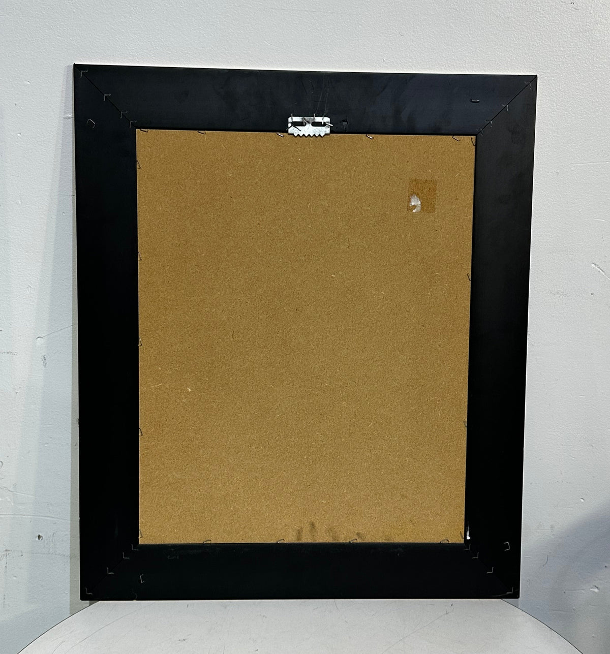 Print of "Blue Nude" (1902) by the Spanish artist Pablo Picasso.