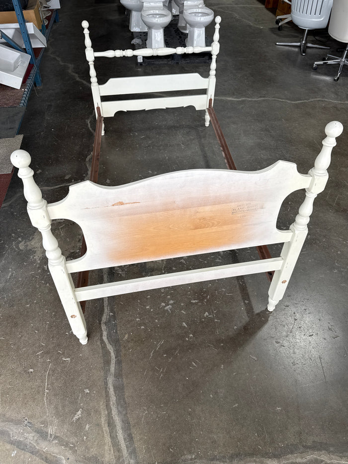 Single White Bed Frame With Small Flower Painted In The Head Board