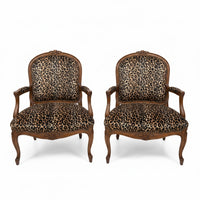 Vintage French Louis XV-style Carved Wood Armchair Featuring Striking Leopard-Print Upholstery and Elegant Cabriole Legs.