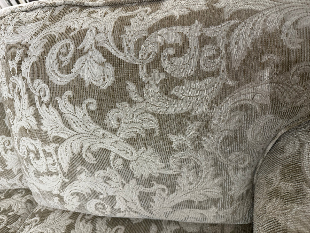 Cream floral patterned love-seat