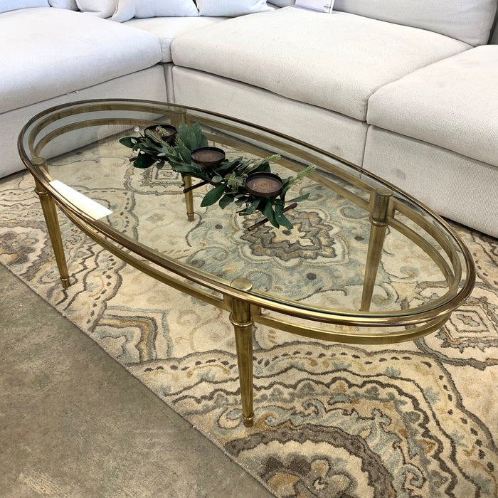 54.5-Inch W Oval Coffee Table – Brushed Brass Frame with Glass Insert