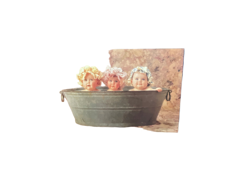 Three Babies in a tub by Anne Geddies