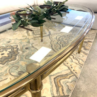 54.5-Inch W Oval Coffee Table – Brushed Brass Frame with Glass Insert