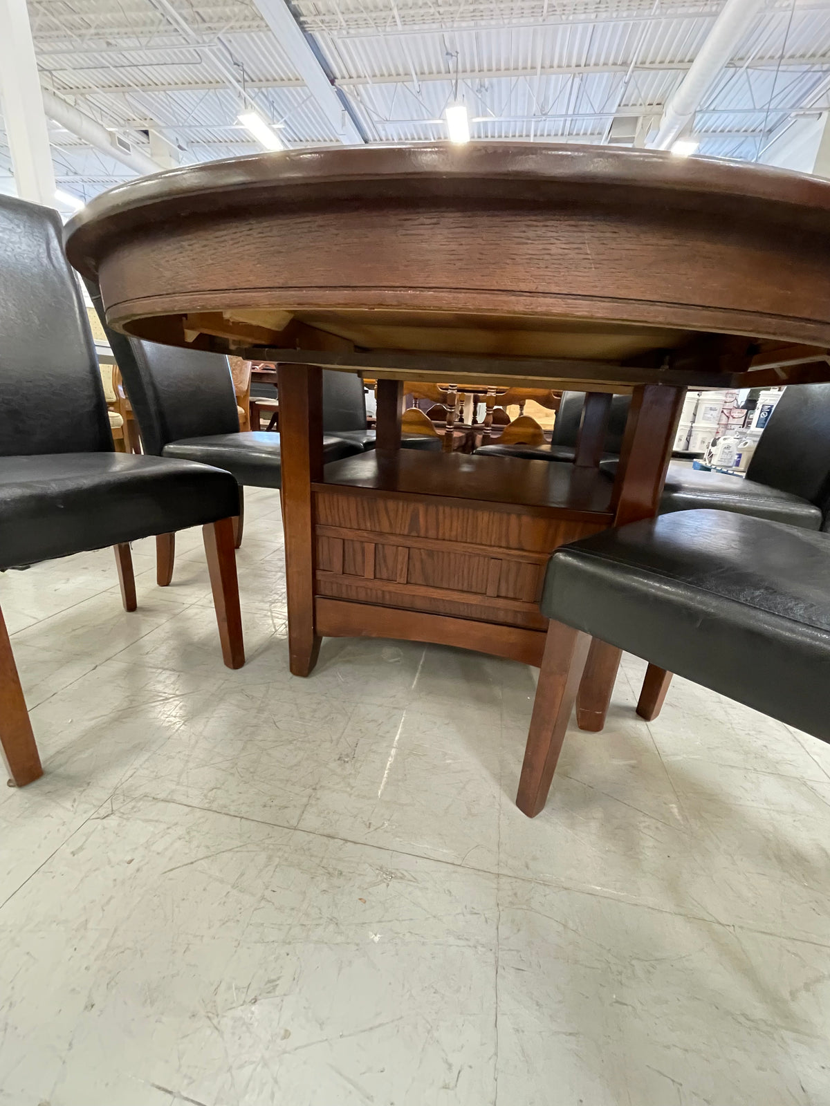 48 in. x 65 in. Wooden Oval Dining Table with 6 Black Leatherette Chairs