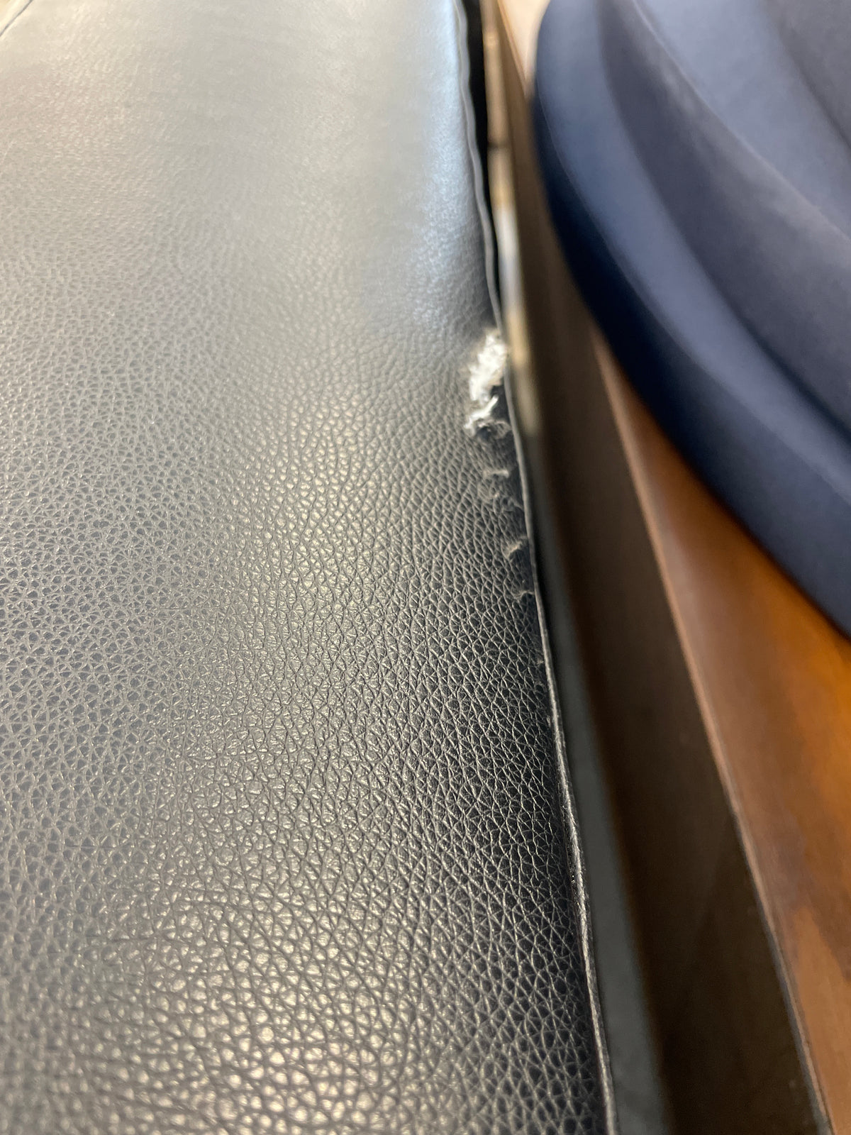 Black Vinyl Sectional Sofa with Silver Legs