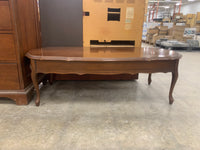 Oval Wooden Coffee Table With Wavy Sides