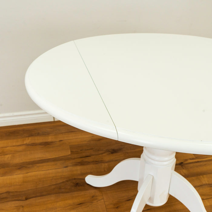 Round Solid Wood Dual Drop Leaf Pedestal Table in White