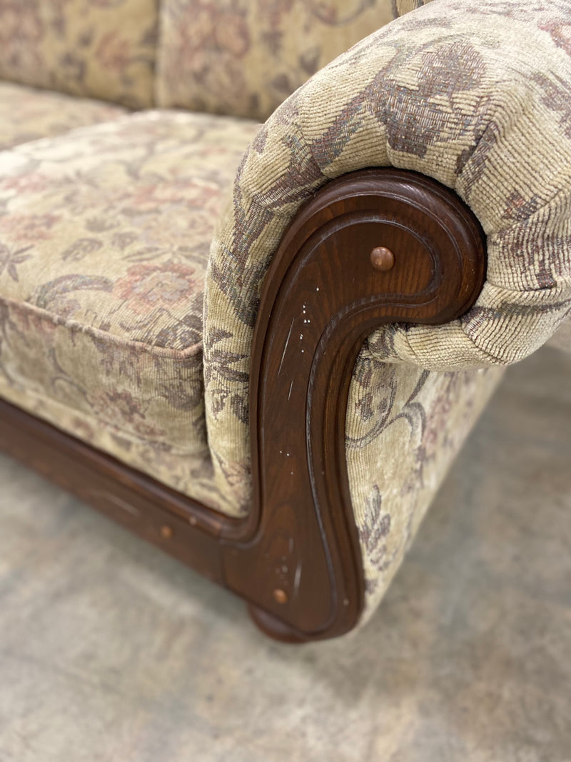 Floral And Dark Wood Loveseat