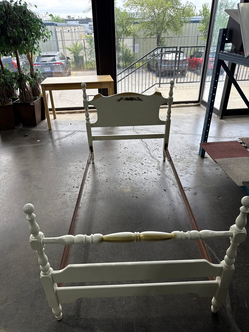 Single White Bed Frame With Small Flower Painted In The Head Board