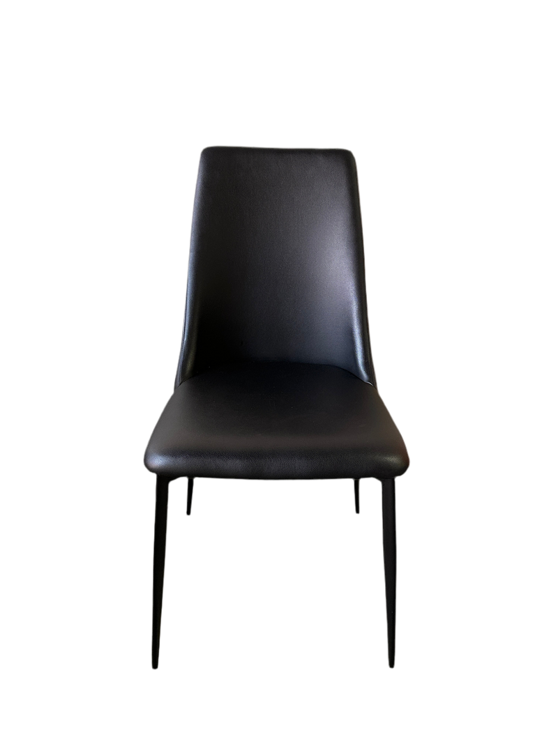 Set of four black dining chairs