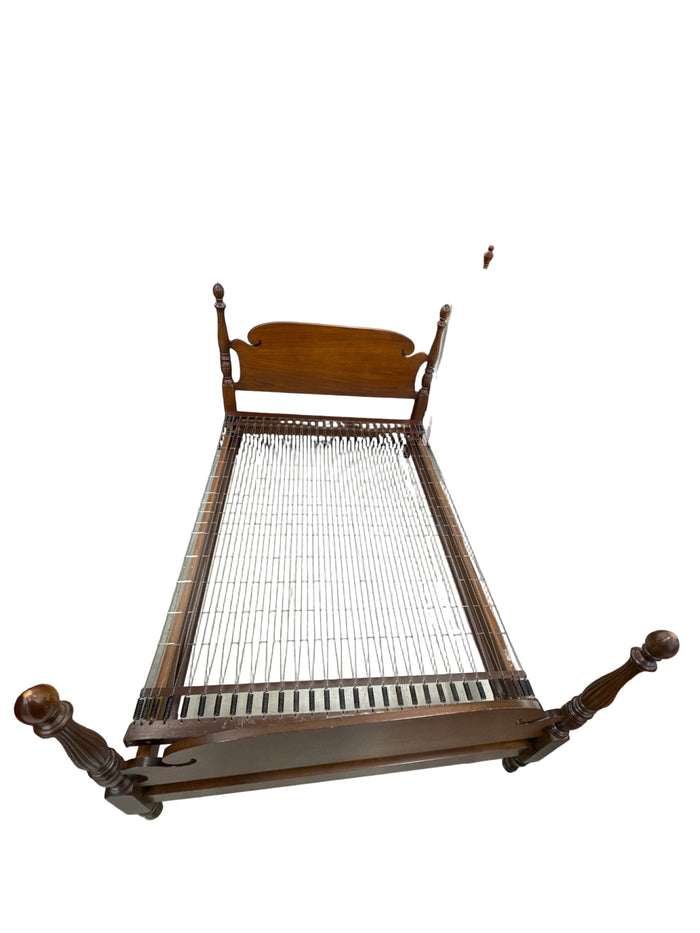 Vintage Wooden Bed Frame with a Cannonball Poster Design and an Integrated Wire Spring Base.