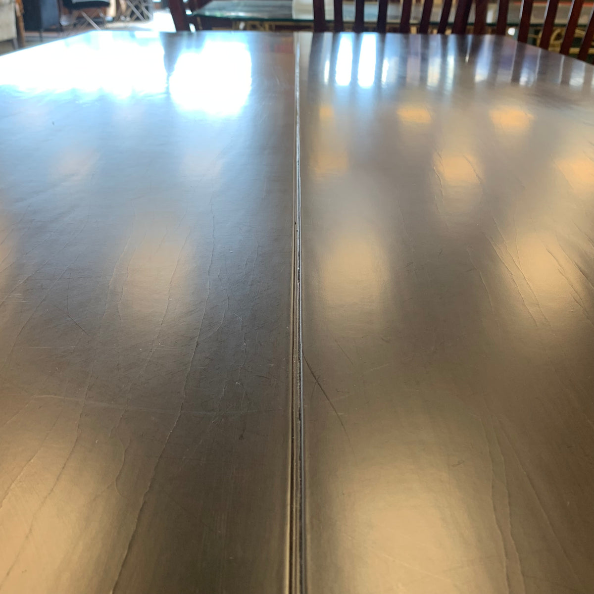 120-Inch W Summit Dining Table – Textured Dark Wood with Sculptural Base