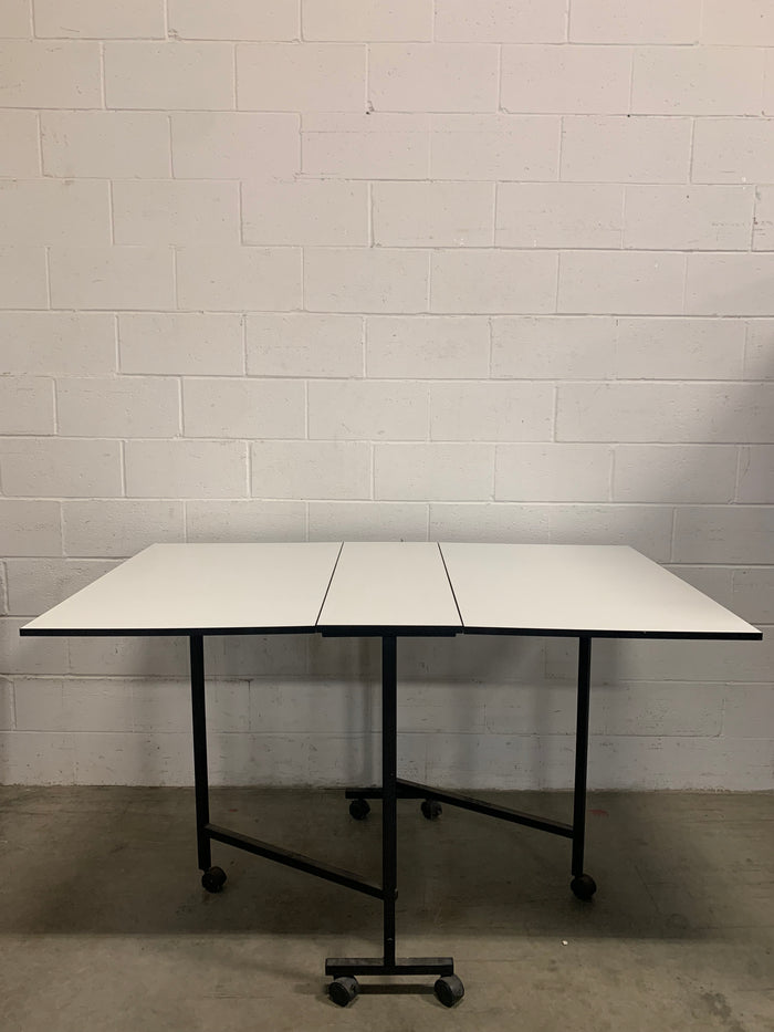 White Table with Folding Arms