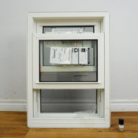 20x28-Inch Double Hung Window in Sandstone with Spring Screen