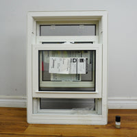 20x28-Inch Double Hung Window in Sandstone with Spring Screen