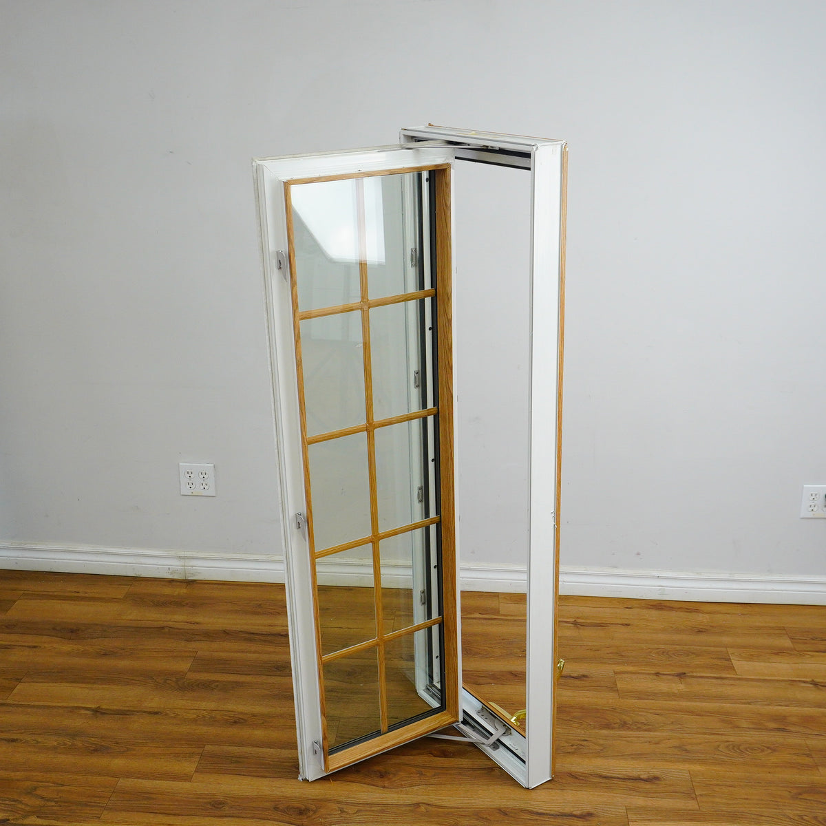 19x60-Inch Laminate Casement Window in Woodgrain Int. White Ext.