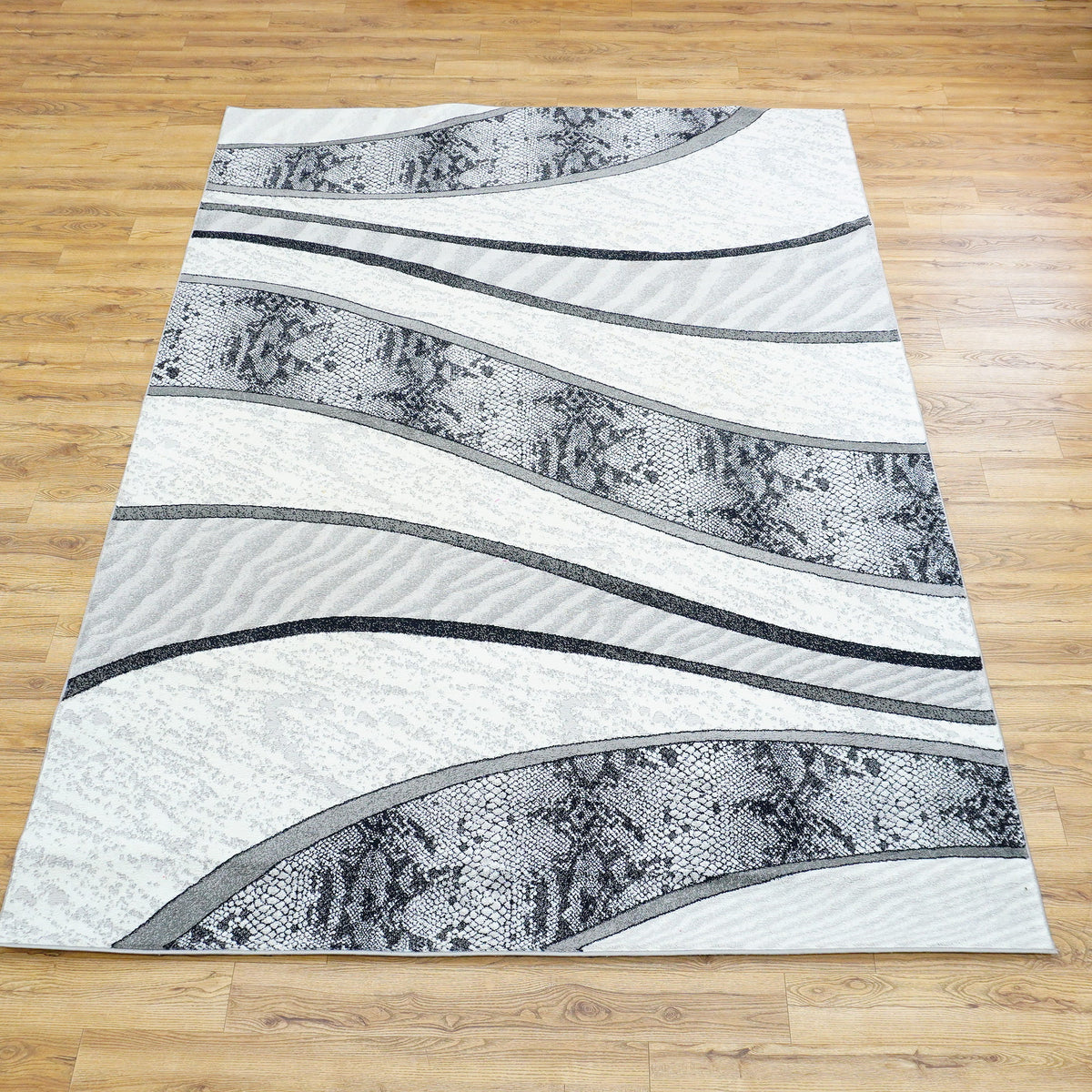 10.5 x 7.9 ft Abstract Wave Pattern Area Rug – Black, White & Gray