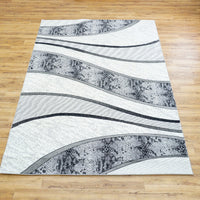 10.5 x 7.9 ft Abstract Wave Pattern Area Rug – Black, White & Gray