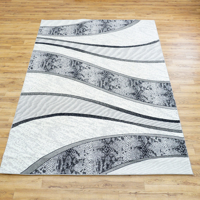 10.5 x 7.9 ft Abstract Wave Pattern Area Rug – Black, White & Gray