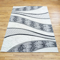 10.5 x 7.9 ft Abstract Wave Pattern Area Rug – Black, White & Gray